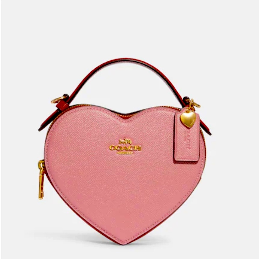 Coach heart ❤️ purse. Pink and red. 6”(L) x 7”(H) x 2 1/2” (W)